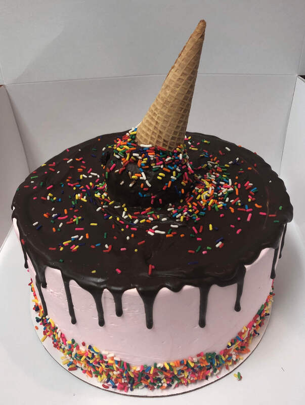 Custom drip birthday cake with a melting ice cream cone on top