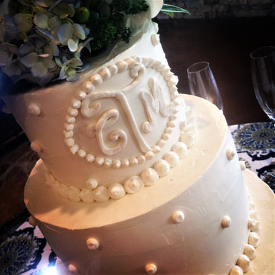 3 tier wedding cake with monogram