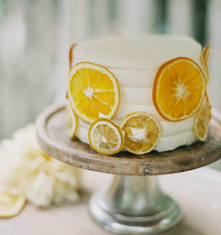 Unique bridal shower cake covered in orange slices
