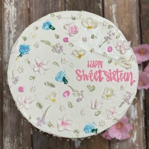 Sweet sixteen cake for girl covered in painted flowers